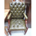 A reproduction Regency style leather armchair