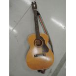 A vintage Stella Harmony acoustic guitar