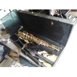 An Arbiter saxophone, in hard case with stand and music