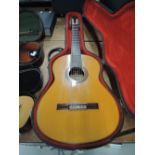 A vintage classical guitar, label for Manuel Lopez Bellido, Number 197, dated 1978, in hard case