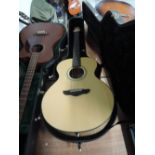 A Northwood electro acoustic guitar, bridge pickup, quilted maple, serial number 00020769, with hard