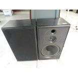 A pair of Jamo speaker cabinets, one loose