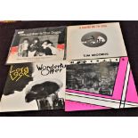 A lot of eight UK Punk / New Wave and Post Punk twelve inch singles