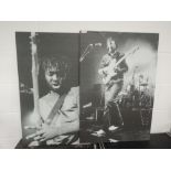 A pair of monochrome prints, poster size Arctic Monkeys and bloc party, with dado rail style