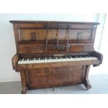 A 19th Century walnut cased upright piano, labelled for Riley & Sons, Birmingham