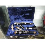 A cased clarinet, stamped serial numbers but no name, case B & H so maybe Boosey and Hawkes