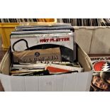 A lof of approximately 25 to 30 albums with seven inch singles and a retro 45 wallet