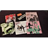 A lot of six seven inch UK Punk singles by '999'