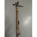 A selection of walking sticks and ice axe