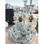 A selection of fine plated table wares including candle sticks
