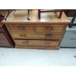 A stripped chest of two over two drawers