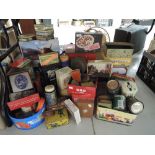 A large collection of vintage and later tins