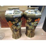 A pair of 1920's design, Losolware vases, in the floral Pagoda pattern on black ground