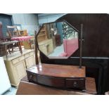 An early 20th mahogany toilet/swing mirror having canted top over drawer base