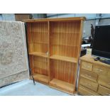 A modern pine double bookcase