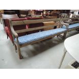 A traditional wooden bench, possibly pew or railway waiting room, approx. 7'