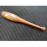 A vintage treen rounders bat