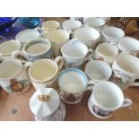 A selection of coronation wares and similar mugs