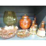 A selection of carnival glass, whiskey bells, and ginger jar