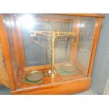 A vintage set of laboratory scales by Brad & Martin, in fitted mahogany case