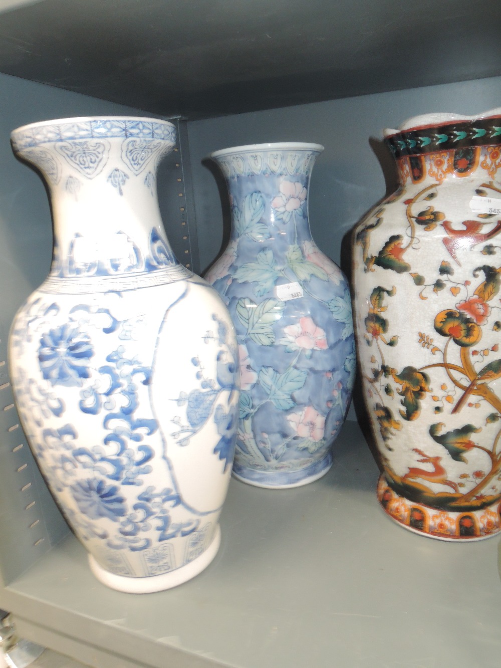 Three urn shaped vases