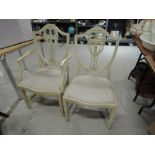 A pair of classical style wash stained chairs (one carver/one diner)