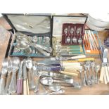 A selection of table wares and cutlery