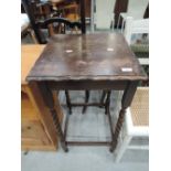 A mid 20th Century oak occasional table