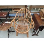 A cane conservatory arm chair