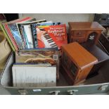 A case of music and wildlife books, and three jewellery boxes