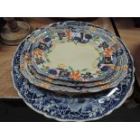 A Masons Ironstone blue and white platter having pictorial landscape decoration and a set of three