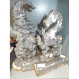 Two cast door stops in the form of Mr Punch and a Seahorse