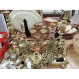 A selection of brass and copper ware including period brass candlestick, arts and craft copper plate