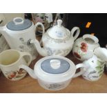 A selection of tea and coffee pots including Susie Cooper