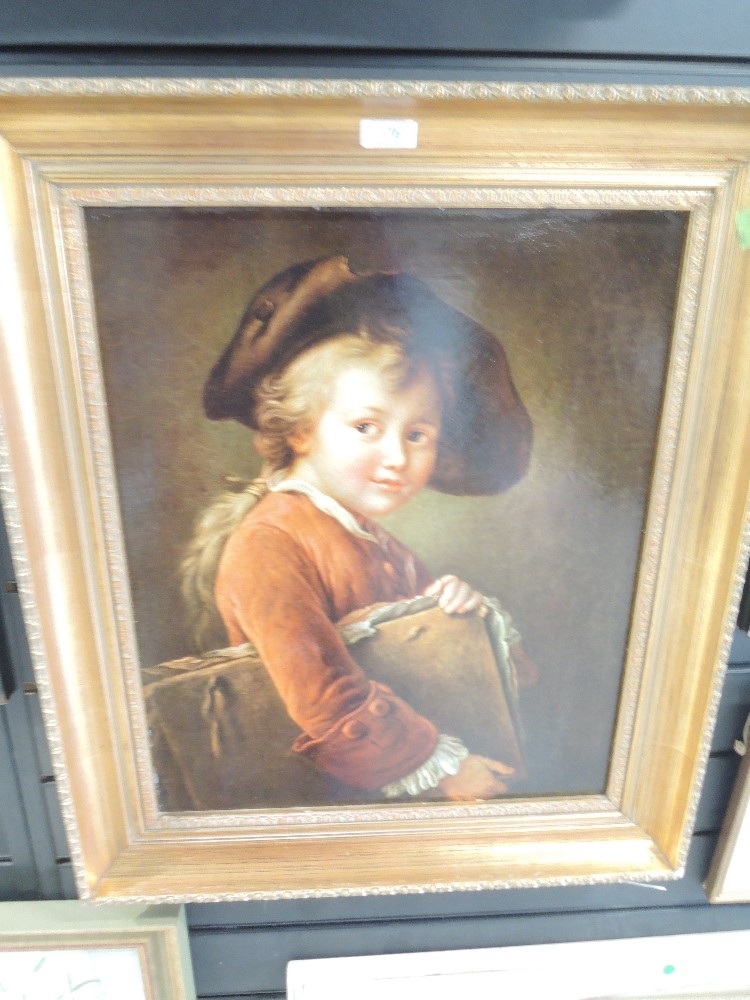A reproduction print of boy with book