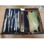 A Victorian cased drawing instrument etc , later squares etc