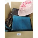 A box full of mixed handbags and similar some of leather others fabric, different sizes and styles.