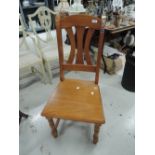 A solid seat dining chair