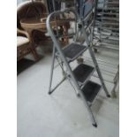 A pair of small size step ladders