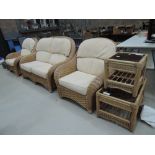 A modern conservatory canework three piece suite and two occasional tables