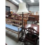 A traditional mahogany style standard lamp