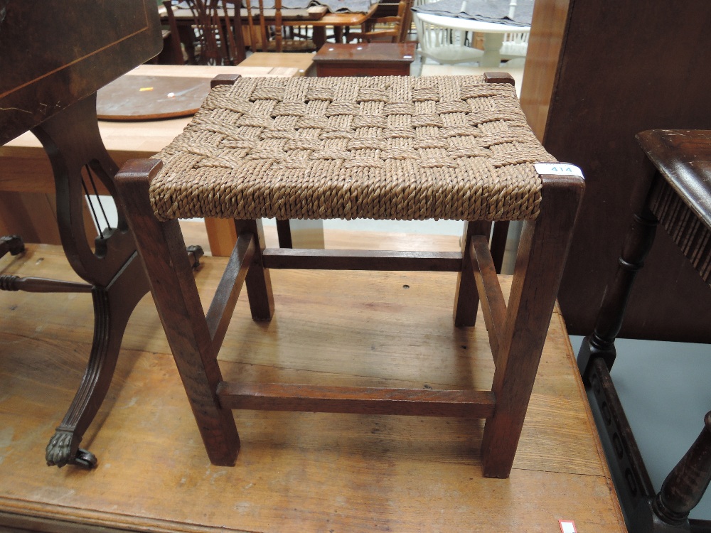 A traditional strung top foot stool