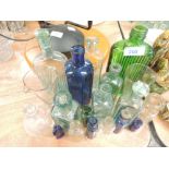 A selection of antique and similar bottles including medical related, poison and colour glass