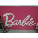 A large shop display sign for Barbie dolls Matel