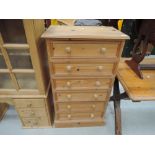 A modern pine six drawer chest