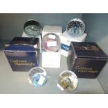 A collection of five Caithness paperweights all with boxes