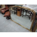 A modern gilt frame over mantel mirror