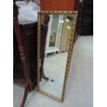 A vintage gilt frame wall mirror