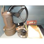 A vintage safety lamp, car horn, steering wheel and othe motoring ephemera