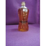 A Dewars 1846-1962 Scotch Whisky in cut glass bottle, no capacity or strength on bottle